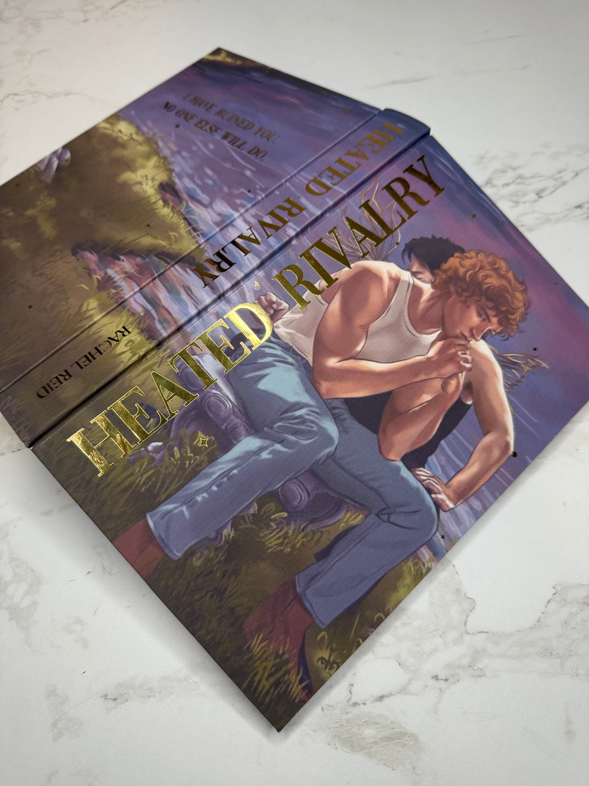 Heated Rivalry by Rachel Reid in collaboration with Andie Burky